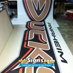 DDI Signs IceFab Mesh Ice Logos, Mesh In Ice Logos, IceFab Under Ice Mesh Logos, Mesh Ice Rink Graphics, Mesh In Ice Logos.ddi-signs-icefab-mesh-in-ice-logos-ducks