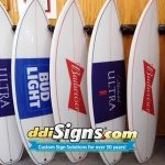 DDI Signs Custom Branded surfboards for Beer Distributor.